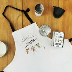 Tablier De Cuisine Dans Sa Boîte De Conserve "Pour La Meilleure Auxiliaire De Puériculture"